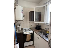 DOS AMBIENTES CON BALCON AL FRENTE - ZONA COLON 2300