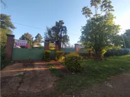 CASA FRENTE AL HOTEL MAITEI, BARRIO PELLEGRINI