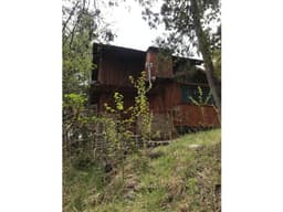 EN VENTA LOTE DE 2500 M2 CON CASA EN EL BOLSÓN CA-215