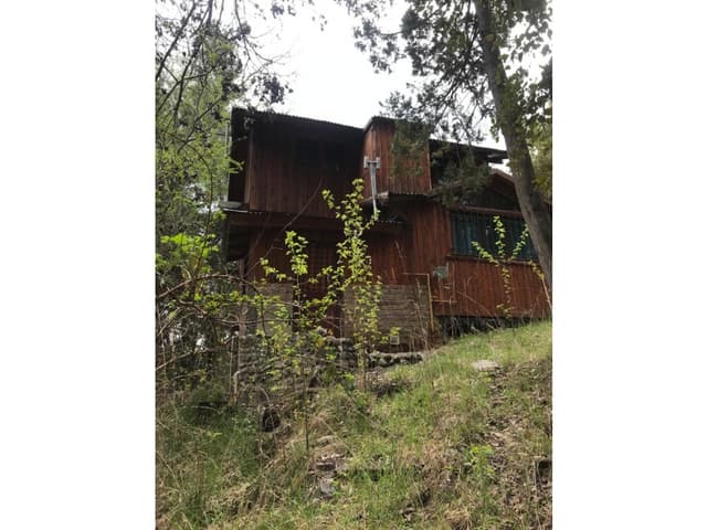 EN VENTA LOTE DE 2500 M2 CON CASA EN EL BOLSÓN CA-215