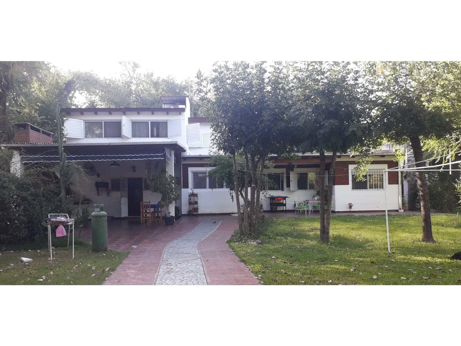 Casa en Andino, 4 dormitorios. Terreno de 900 m2 — foto 1