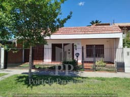 CASA DE 4 AMBIENTES APTO CREDITO CON FONDO Y GARAGE ITUZAINGO NORTE