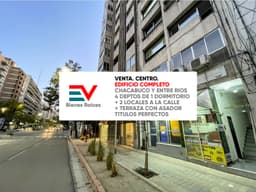 VENTA. EDIFICIO COMPLETO. CENTRO, SOBRE BVD CHACABUCO! DOS LOCALES + 4 DEPTOS 1 DORM + TERRAZA CON ASADOR!