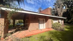 Casa con jardin en barrio centro Funes, Terreno de 1000mts2