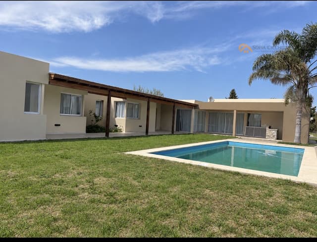 EN VENTA - PUERTO ROLDÁN BARRIO CERRADO- 3 DORMIT-4 BAÑOS- PISCINA